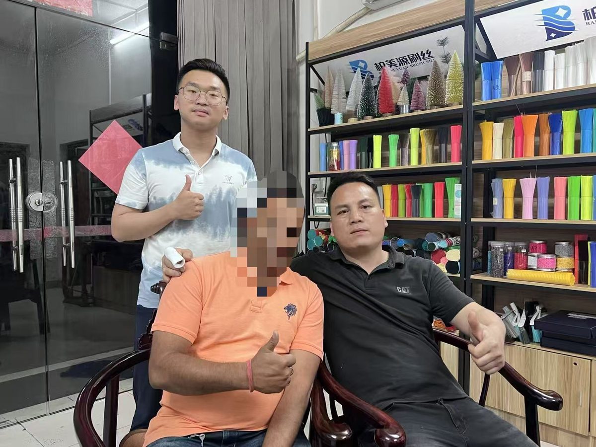 Customer and team reviewing filament samples in the showroom